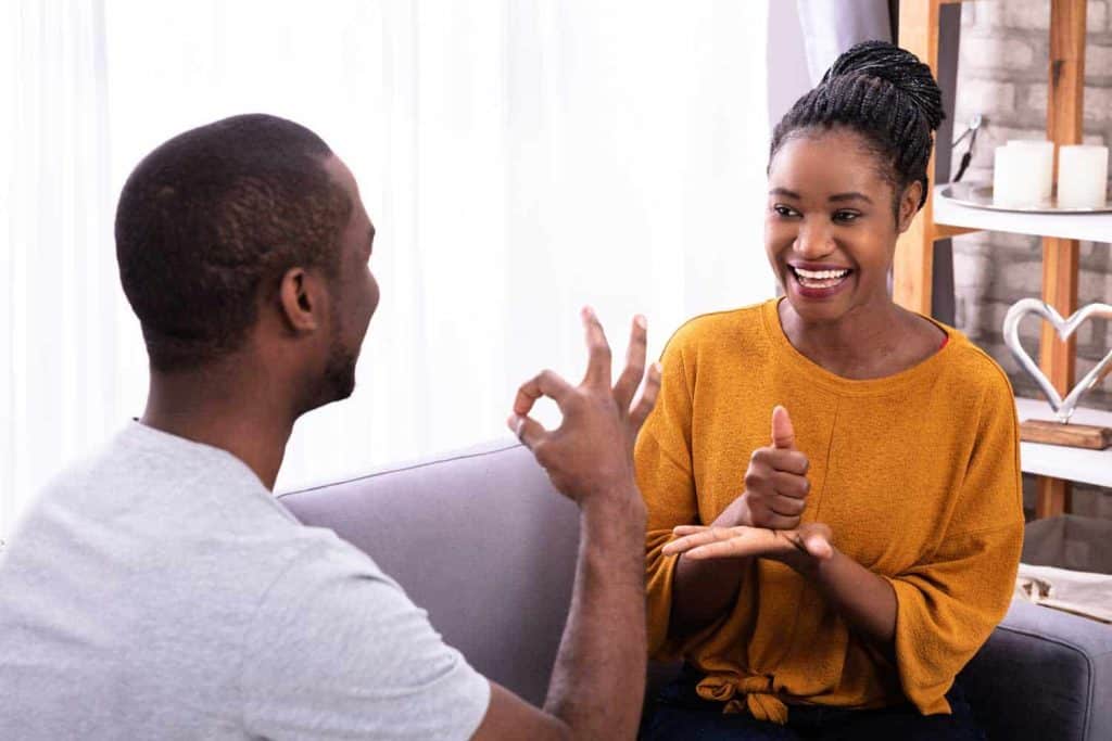 man and daughter sign language