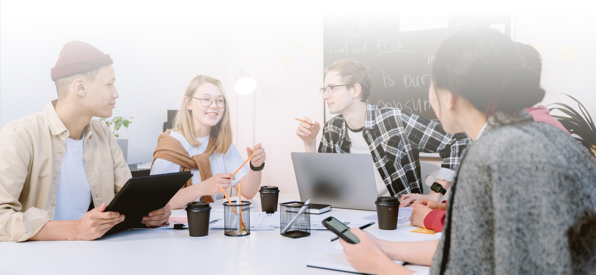 A strategic marketing team gathered around a table.