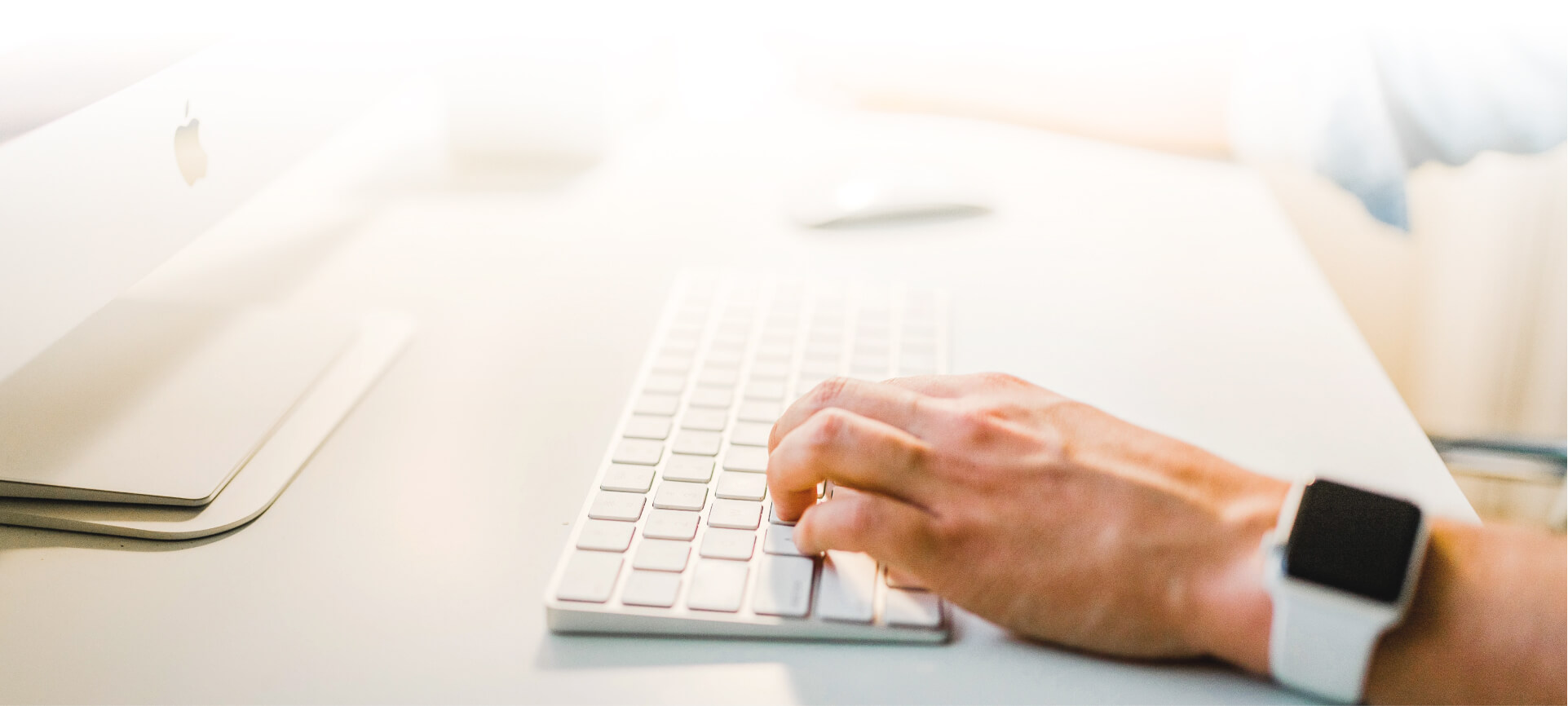 A person is conducting keyword research on a computer.