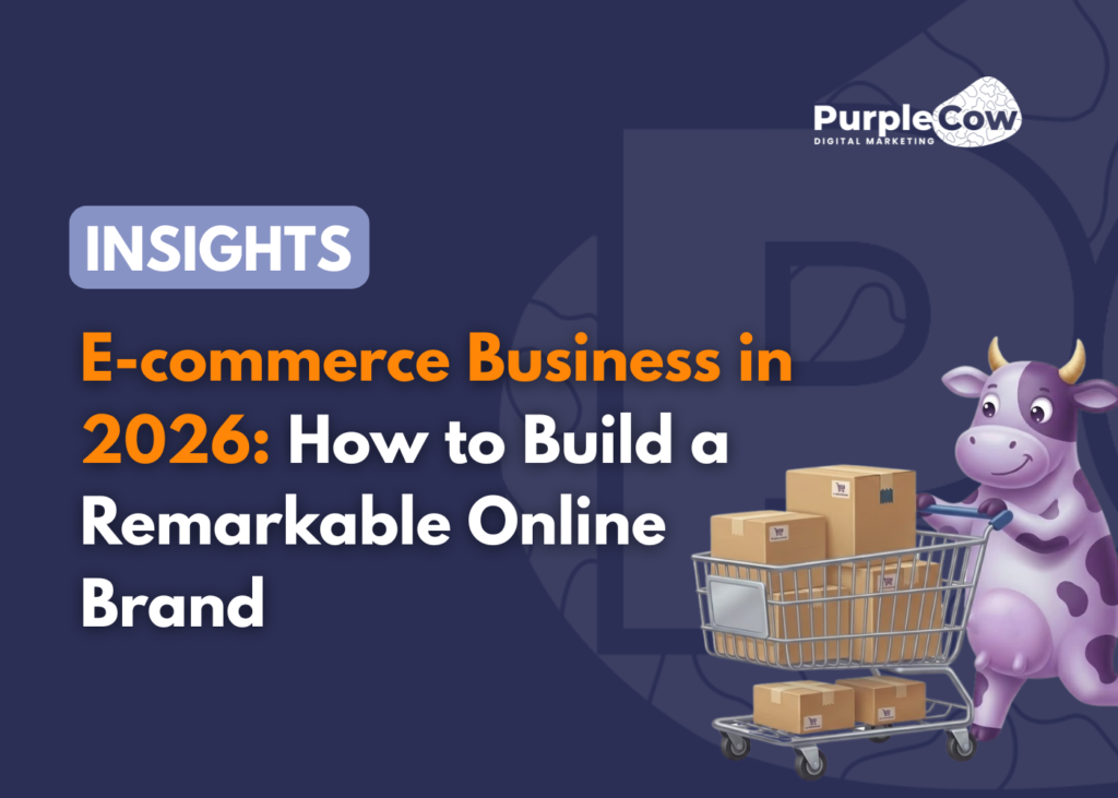 A cartoon cow stands next to a shopping cart filled with boxes. Text reads: "E-commerce Business in 2026: How to Build a Remarkable Online Brand." Purple Cow Digital Marketing logo.